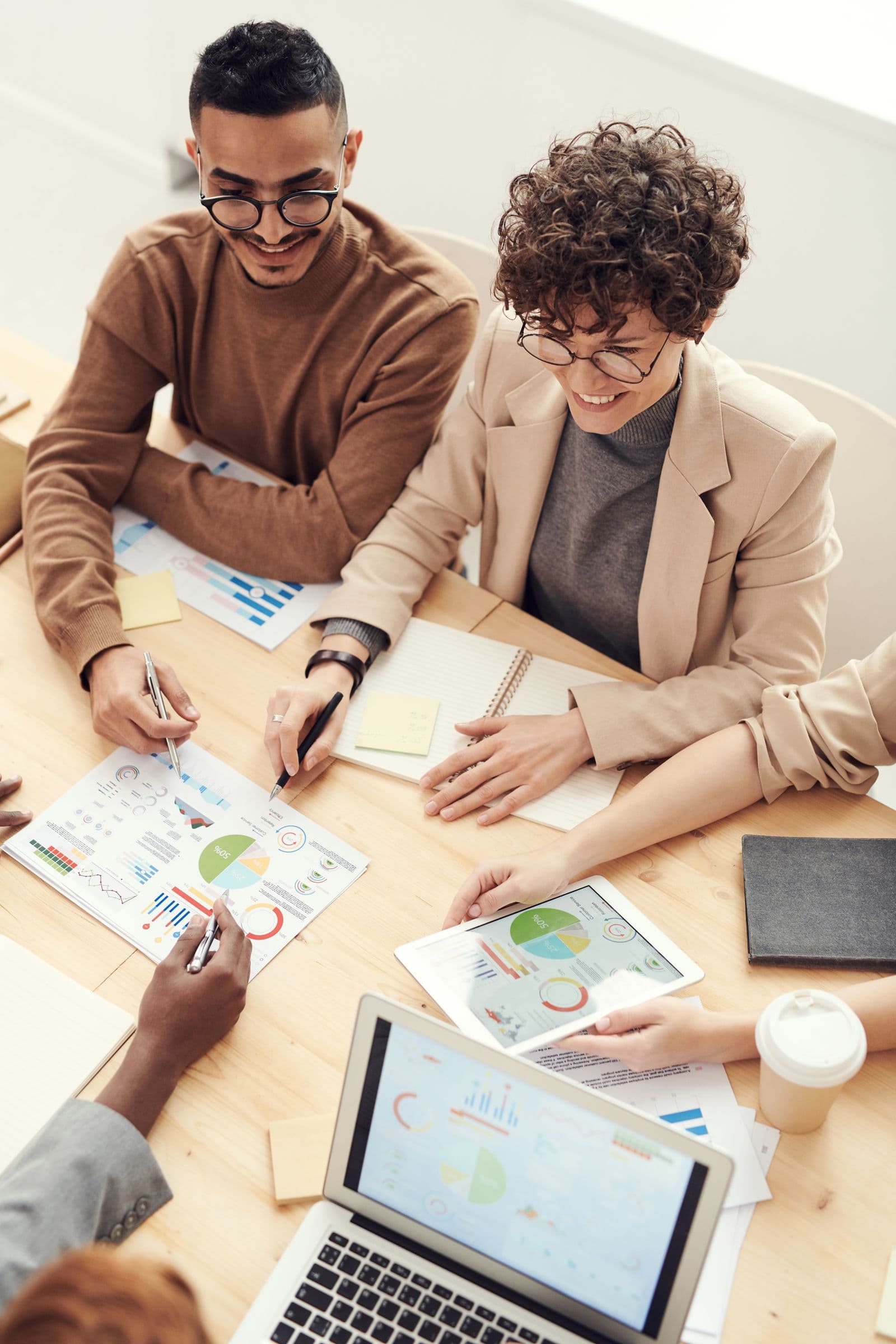 Professionals reviewing charts together